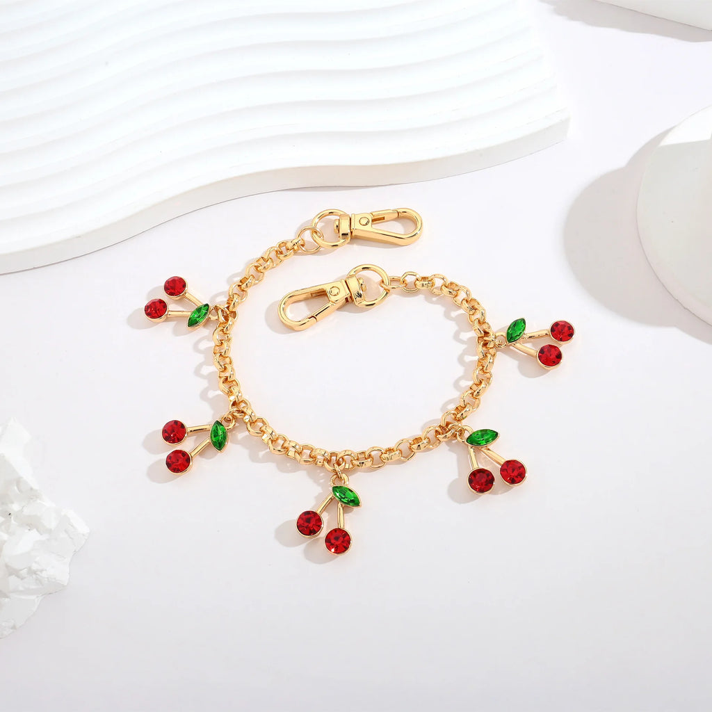 Llavero de cereza con perlas